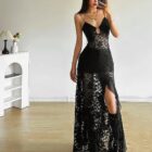 Black gothic aesthetic dress, long lace gown with a slit, transparent detailing.