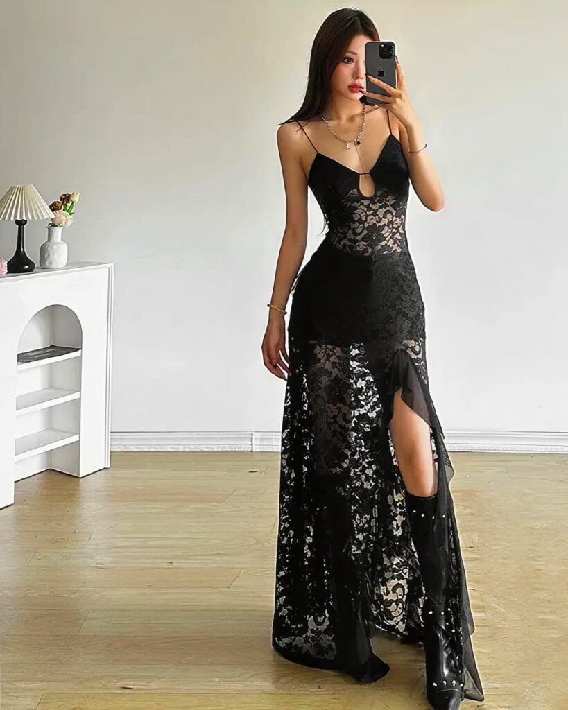 Black gothic aesthetic dress, long lace gown with a slit, transparent detailing.
