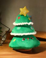 Kawaii christmas plushie of a green felt Christmas tree with a star and ornaments.
