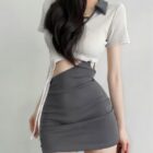 Tied Dress - Coquette Aesthetic: A gray mini skirt paired with a white blouse featuring a cut-out detail and lace trim.