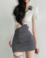 Tied Dress - Coquette Aesthetic: A gray mini skirt paired with a white blouse featuring a cut-out detail and lace trim.