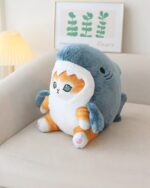 Kawaii Mango cat shark plushie, a blue plush shark with a cat face and paws.