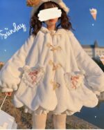 Fluffy rabbit ears hoodie featuring a soft, oversized design with delicate details.