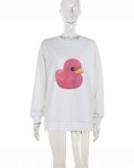White pullover sweater featuring a pink duck graphic. This pink duck sweater is a cute casual top.