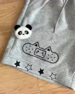 Gray Kawaii Neko shorts featuring a panda, cat bandage, and star details.