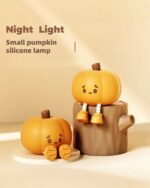 Small pumpkin silicone night light featuring kawaii design.