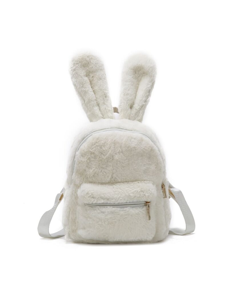 White plushie rabbit backpack with ears and a zippered pocket.