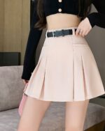 High Waist Casual Skirt - Korean Aesthetic, a light pink pleated skirt worn by a woman.