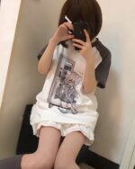 Harajuku detachable sleeve shirt featuring a cartoon graphic and lace trim. Cutecore style.