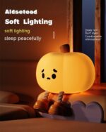 Pumpkin night light featuring a kawaii silicone pumpkin emitting soft lighting.