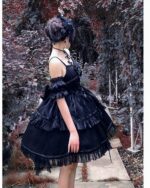 Black gothic lolita dress set with layered ruffles and lace details, showcasing a full skirt and off-the-shoulder sleeves.