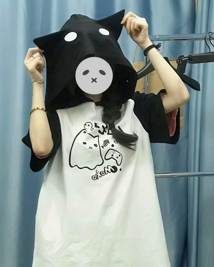 Black ghost neko hooded t-shirt, Harajuku aesthetic, featuring a cute cartoon design.