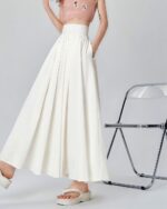White long loose summer skirt, Korean aesthetic, flowing style.