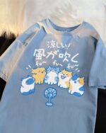 The Wind Blows Cool cat and dog tee featuring cute cartoon dogs and cats.