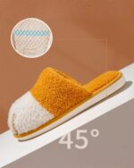 Close-up of orange cat paw slippers, size 8-13, 250mm. Cat paw slippers.