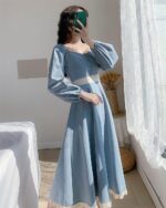 Blue french aesthetic dress with a square collar, puff sleeves, and lace detailing.