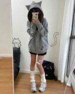 Kawaii cat paw hoodie, grey zip-up sweatshirt with paw print design, Harajuku aesthetic.