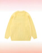 Yellow cat embroidered sweater, a loose knit, long-sleeved top view.