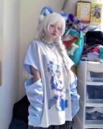 A light blue harajuku detachable sleeve shirt worn by a person with white hair and accessories.