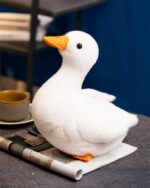 Goosy the White Duck Plushie, a soft, plush white duck toy with detailed features.