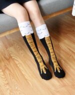 Kawaii chicken legs socks covering legs and feet, cartoon design.