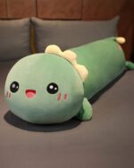Cute green kawaii sleeping pillow featuring a dinosaur design, long plush toy.