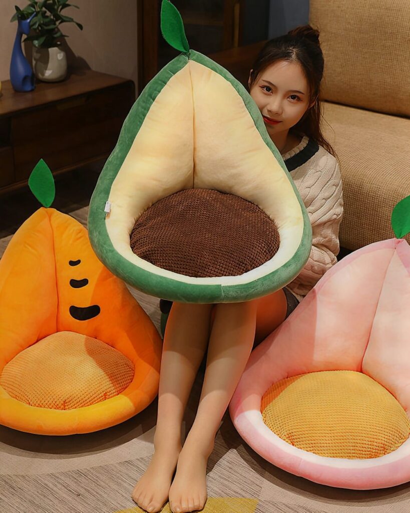 Kawaii fruit cushion featuring an avocado design, plush seat for comfortable seating.