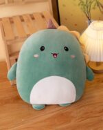 Green squishy animal plushies featuring a smiling dragon design.