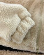 Close-up of a fluffy harajuku dino hoodie, showcasing the soft, plush texture.