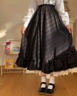 Ruffled high waist gothic lolita long skirt in black, featuring white lace trim and a layered ruffled hemline.