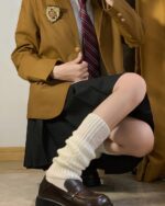 White japanese gyaru socks worn with a school uniform outfit.