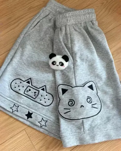 Gray kawaii neko shorts with cat, panda, and bandage designs.