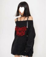 Black gothic aesthetic sweater with off-shoulder design and red embroidery details.