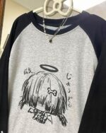 Gray animecore sweatshirt featuring a Japanese manga illustration with a halo and text.