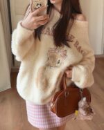 Vintage bunny aesthetic sweater with a plush, cream-colored design and 'Treasure Bag' text.