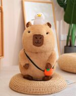 Capybara plushie with a duck and carrot accessory, soft plush toy.