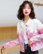 Pink korean jacket worn by a woman, featuring a white and pink plaid design.