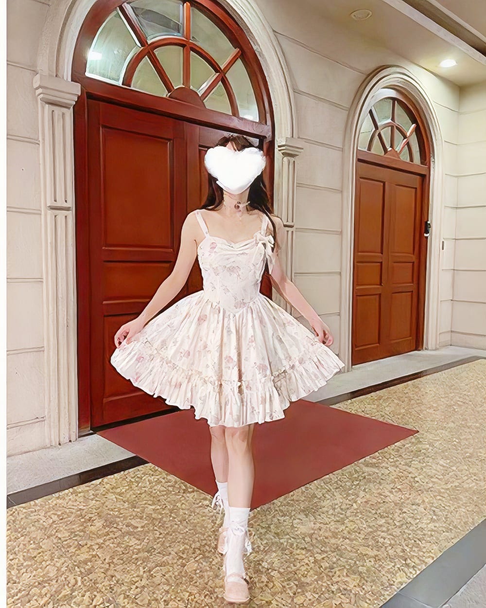 Woman wearing a Bow Floral Dress - Soft Girl Aesthetic, featuring a floral print and spaghetti straps.