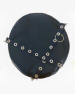 Black vegan leather studded punk beret displaying metal eyelets and straps.