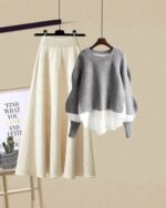 Gray and white korean aesthetic set featuring a sweater and wide-leg pants, displayed on a hanger.