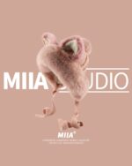 MIAA Fox Ears Plush Winter Hat, pink and brown fuzzy design.