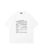 White tee shirt featuring an artsy aesthetic design with musical notation and text: 'To Hidden Valley'.