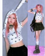 Rabbit ears hooded t-shirt featuring a white star print, worn by a model.