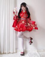 Red harajuku aesthetic yukata with floral print, featuring a ruffled design and kimono sleeves.