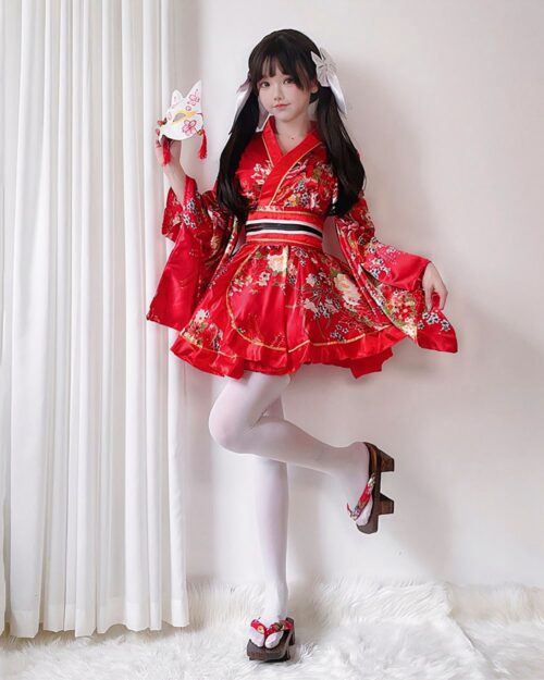 Red harajuku aesthetic yukata with floral print, featuring a ruffled design and kimono sleeves.