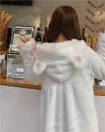 White kawaii cat hoodie with fluffy ears and hood, padded coat style.