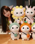 Kawaii bunny plushie Cotton the Adventurous Rabbit wearing a hat with a frog and carrot accessories.