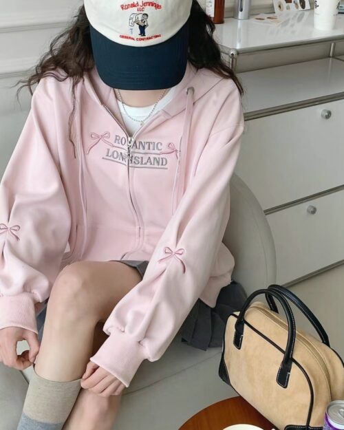 Pink romantic zipper hoodie featuring "ROMANTIC LONG ISLAND" embroidery.