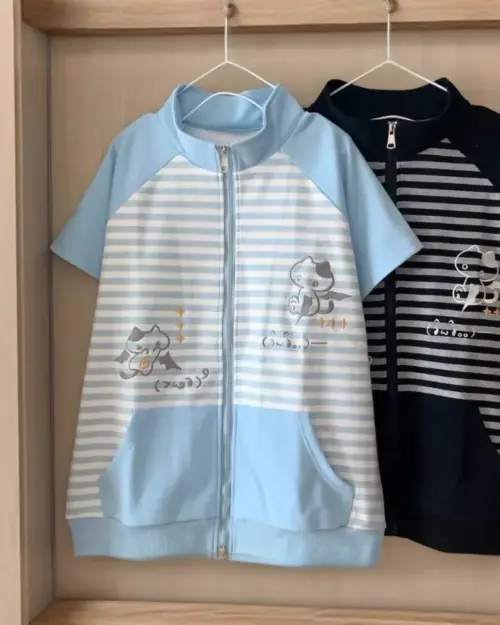 Blue and white japanese striped loungewear set with cute cat illustrations.