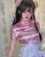 Pink maid hanfu dress featuring floral details and a ruffled skirt.